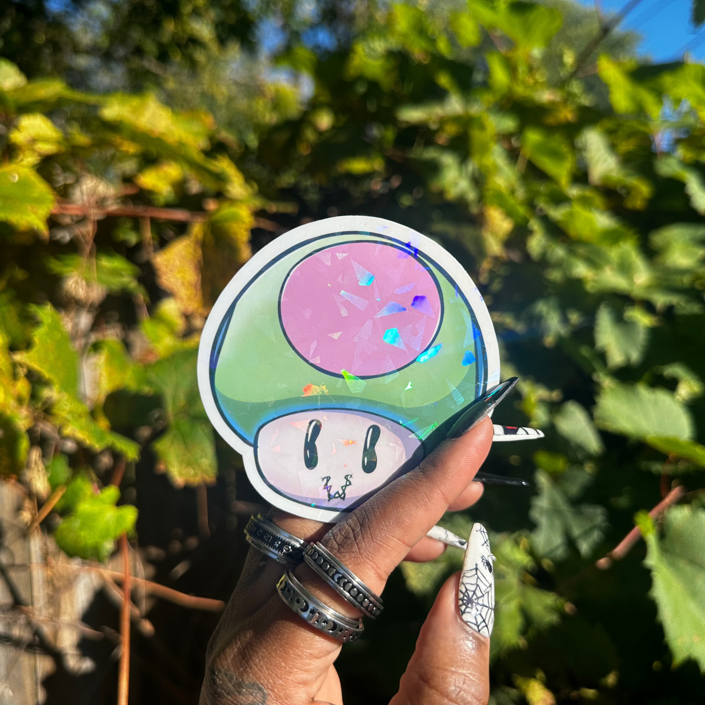 Holographic Glitter SpkXEvl x Mario Villain Mashup One Up Mushroom Sticker